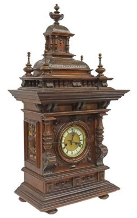 Appraisal: Monumental German walnut mantel clock Hamburg American Clock Company late