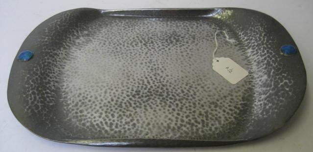 Appraisal: A TUDRIC PEWTER TRAY of rounded oblong form the solid