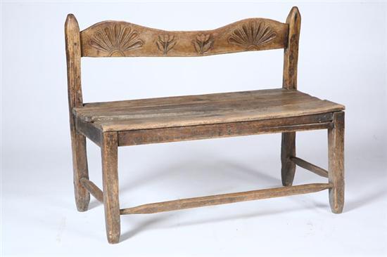 Appraisal: CARVED BENCH Probably Southwestern th century pine The crest is