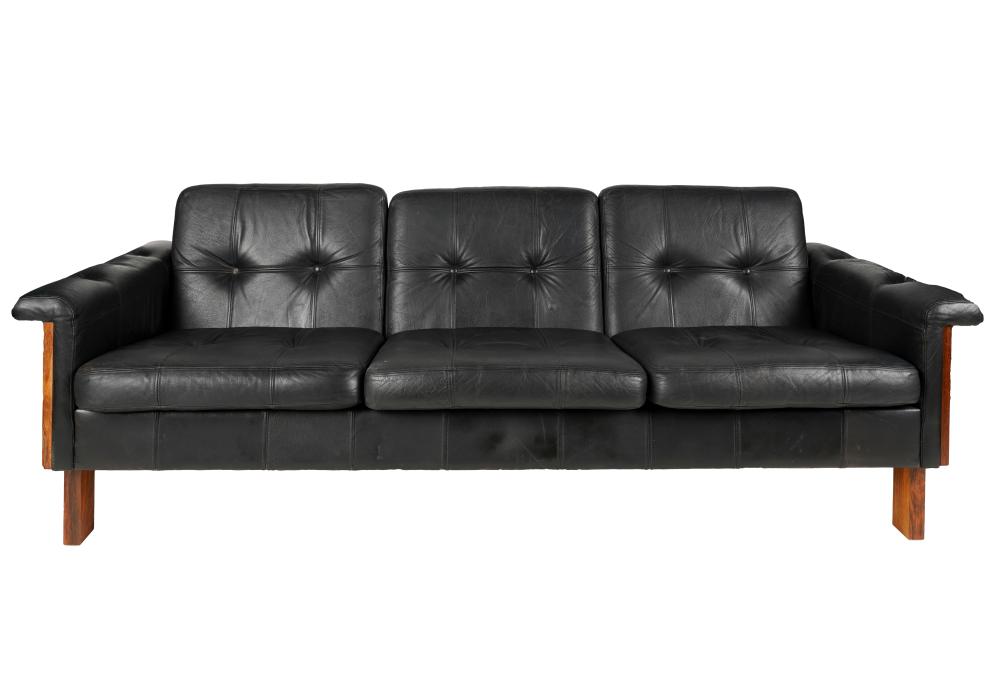 Appraisal: BLACK LEATHER ROSEWOOD SOFAstyle of Yrjo Kukkapura third quarter th