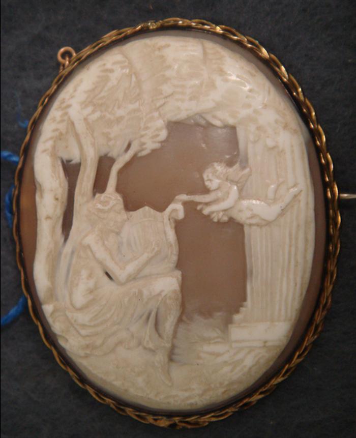 Appraisal: Unmarked YG oval shell carved cameo pin lady playing harp