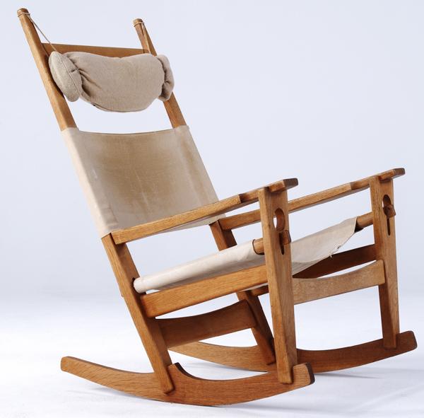 Appraisal: WEGNER GAETAMA Keyhole rocker with canvas sling seat and back