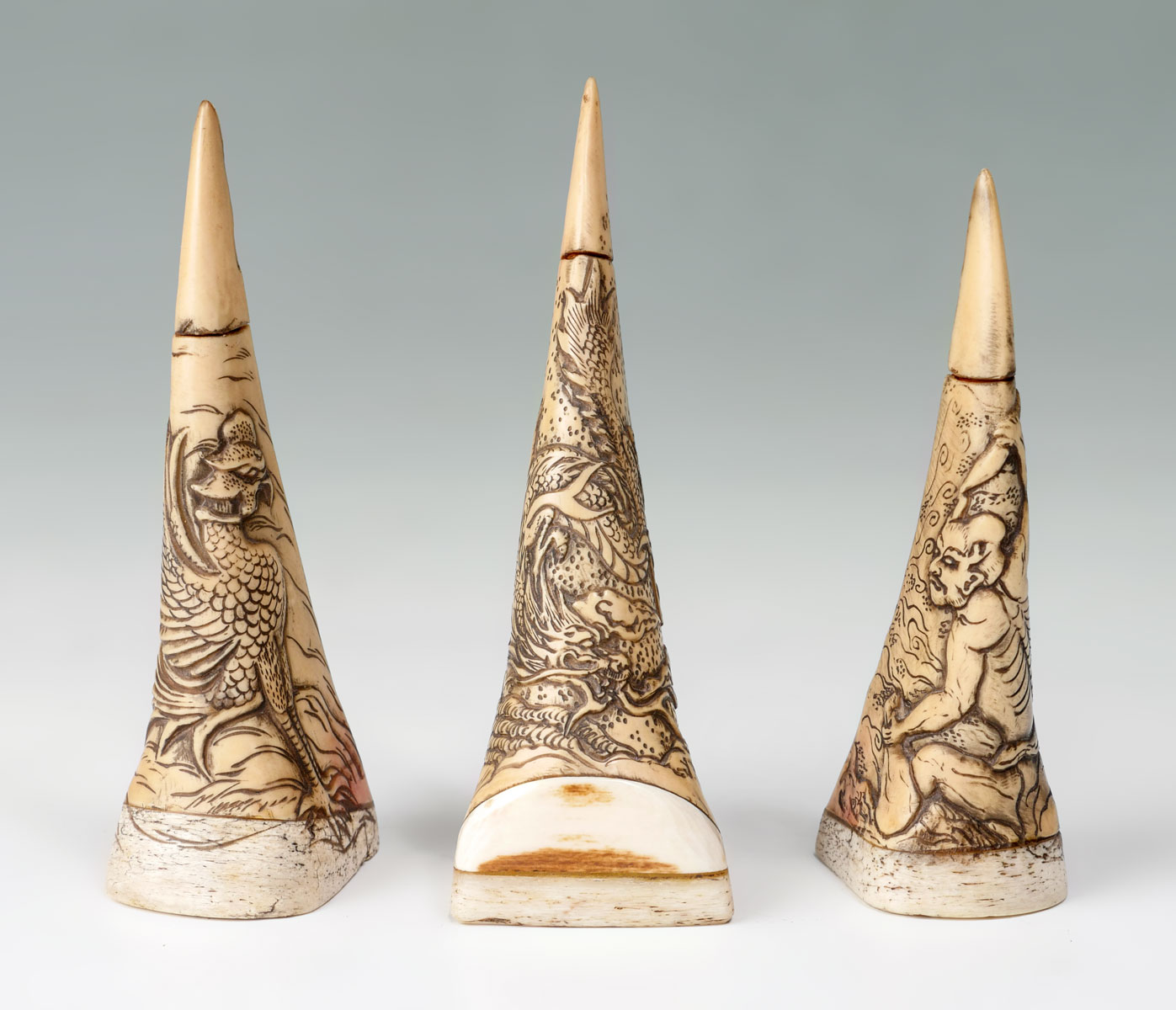 Appraisal: HORN BILL SCRIMSHAW SNUFF BOTTLES elaborately carved Scrimshaw Horn bills