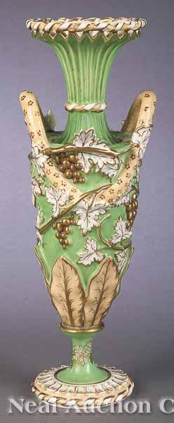 Appraisal: An English Polychromed Soft-Paste Porcelain Vase mid- th c urn-shaped