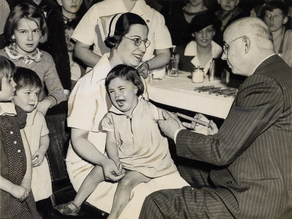 Appraisal: MEDICINE Gathering of timely press photographs of kids and adults