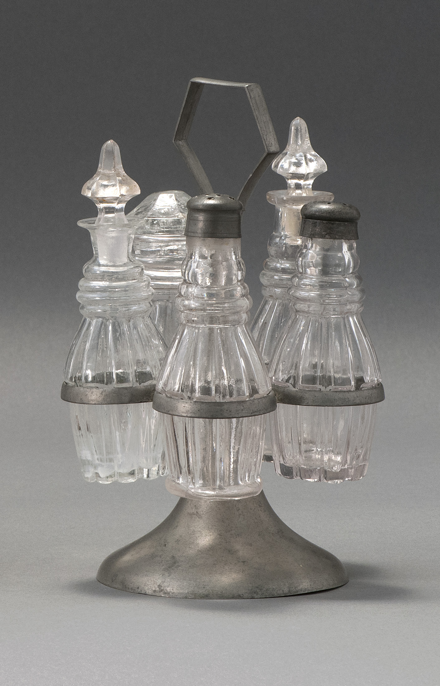 Appraisal: FIVE-BOTTLE CLEAR GLASS BLOWN -MOLD CASTOR SET Second Quarter of