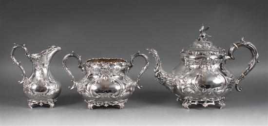 Appraisal: English repousse sterling silver three-piece tea service Martin Hall Co