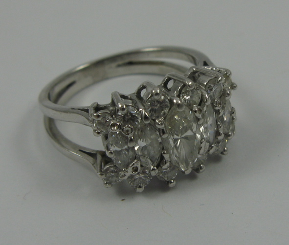 Appraisal: DIAMOND AND K WHITE GOLD RING set with round-cut diamonds