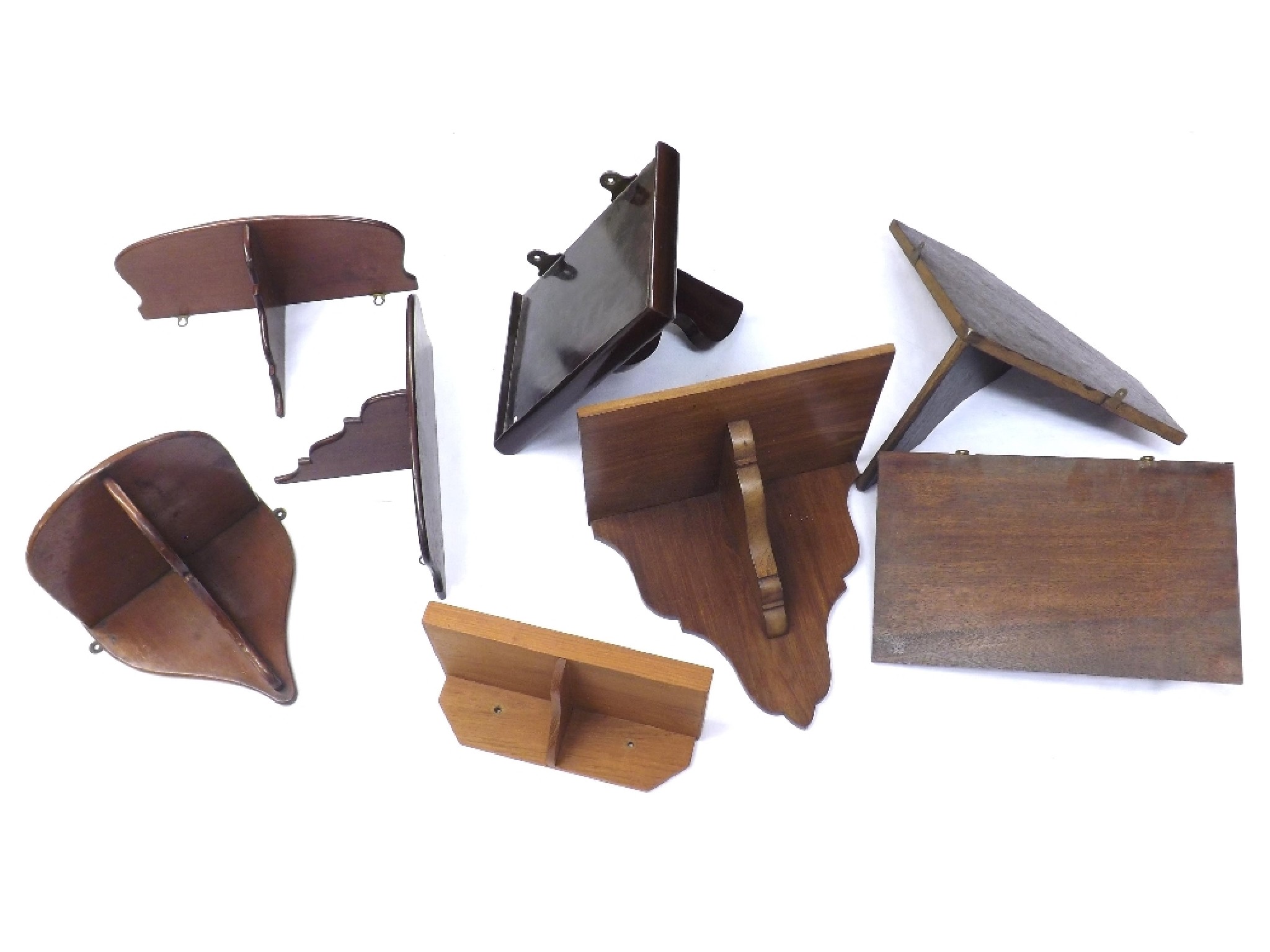 Appraisal: Eight various size wooden clock wall brackets