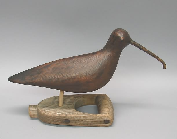 Appraisal: Hookbill curlew stick-up on wood handle attributed to Jona Sprague