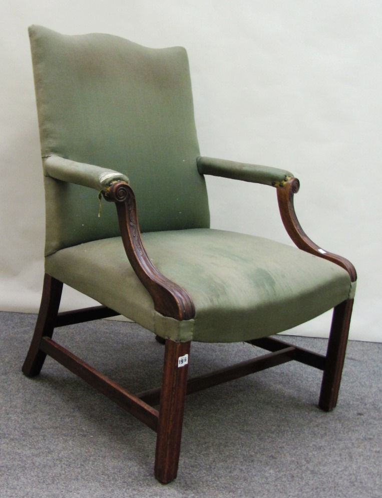 Appraisal: An th century style mahogany framed Gainsborough open armchair on