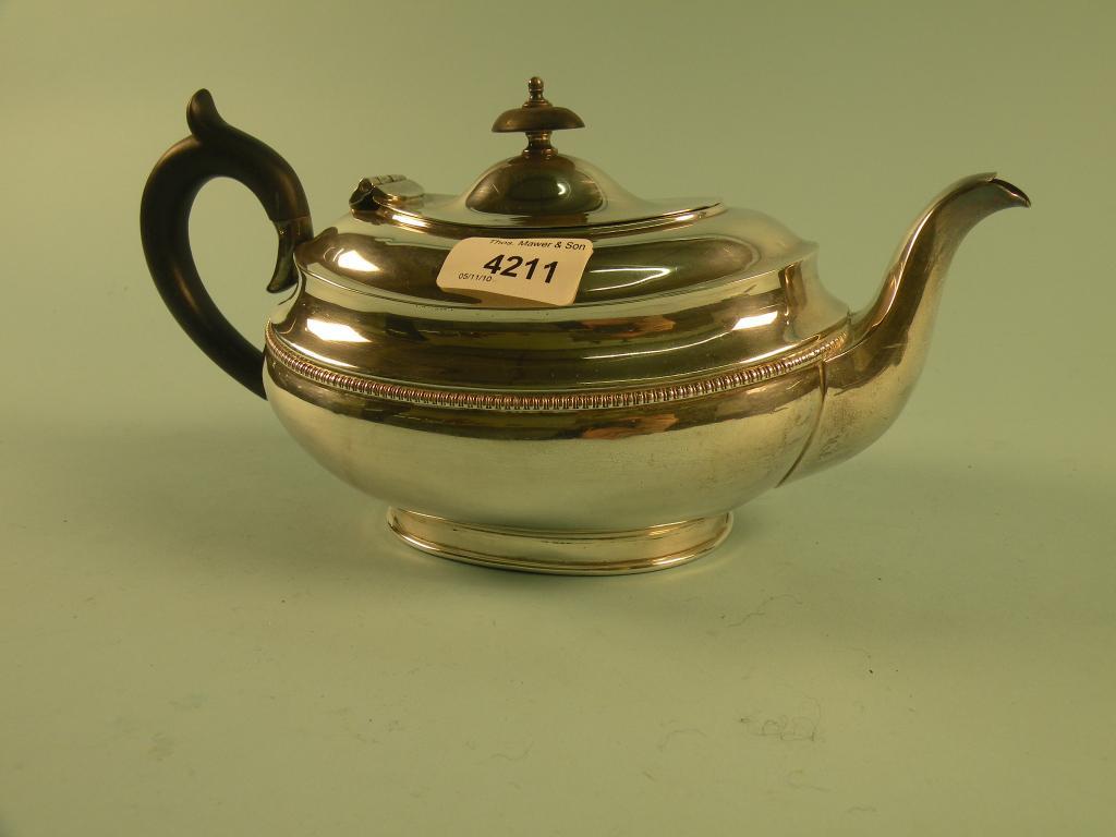 Appraisal: A silver teapot with a beaded border ozs gross approx