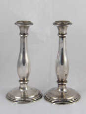 Appraisal: A pair of Viennese silver baluster candlesticks Vienna standard assay