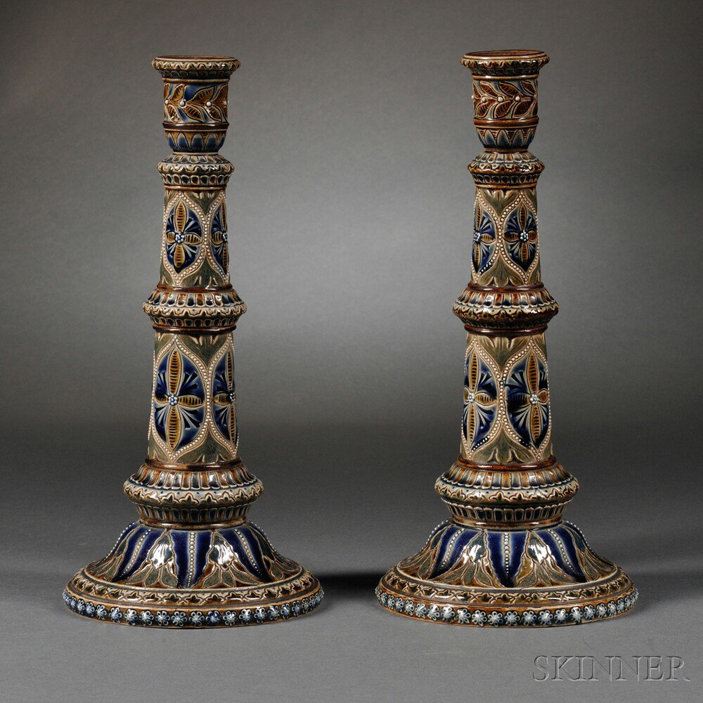 Appraisal: Pair of Doulton Lambeth Stoneware Candlesticks England stylized foliate and