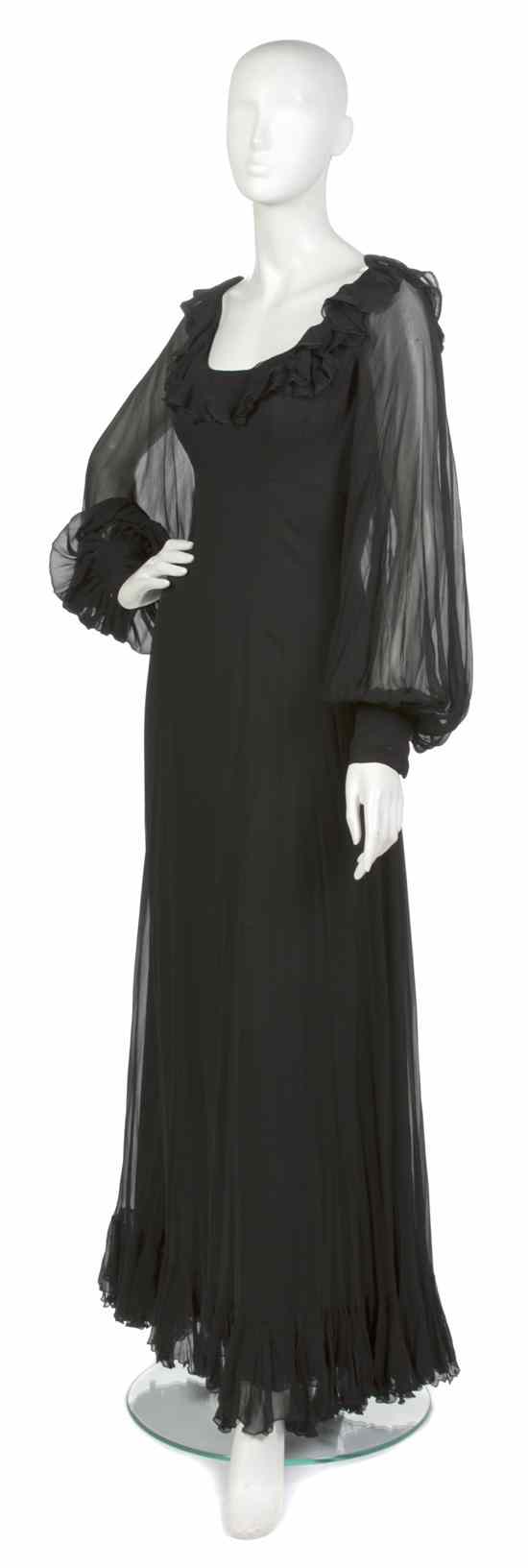 Appraisal: A Stavropoulos Black Chiffon Evening Gown sheer long sleeves ruffle