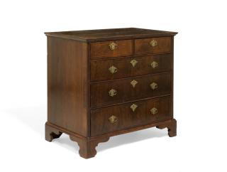 Appraisal: A GEORGE III WALNUT CHEST OF DRAWERS A GEORGE III