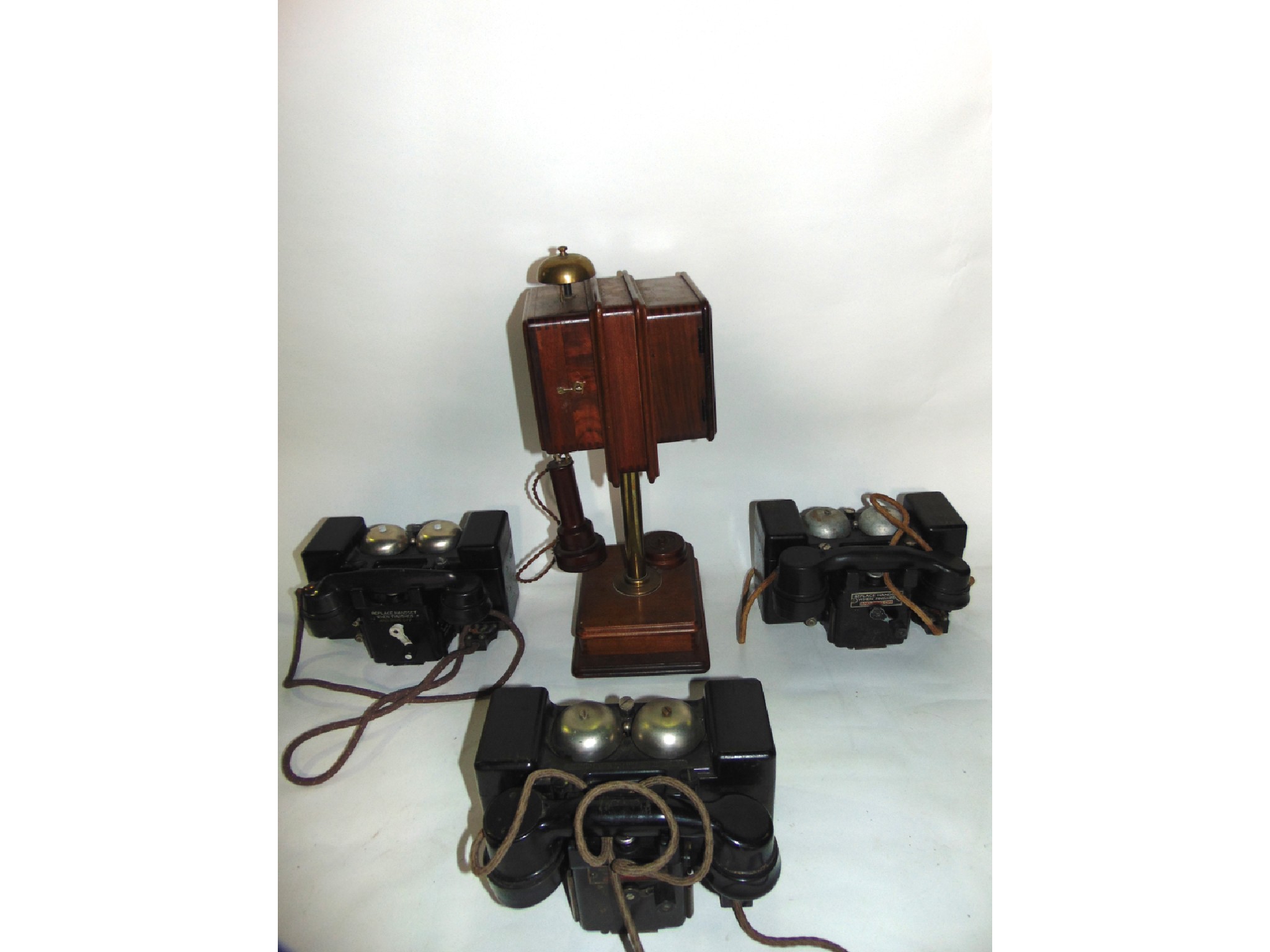 Appraisal: A trio of field telephones each marked telephone set 'F'