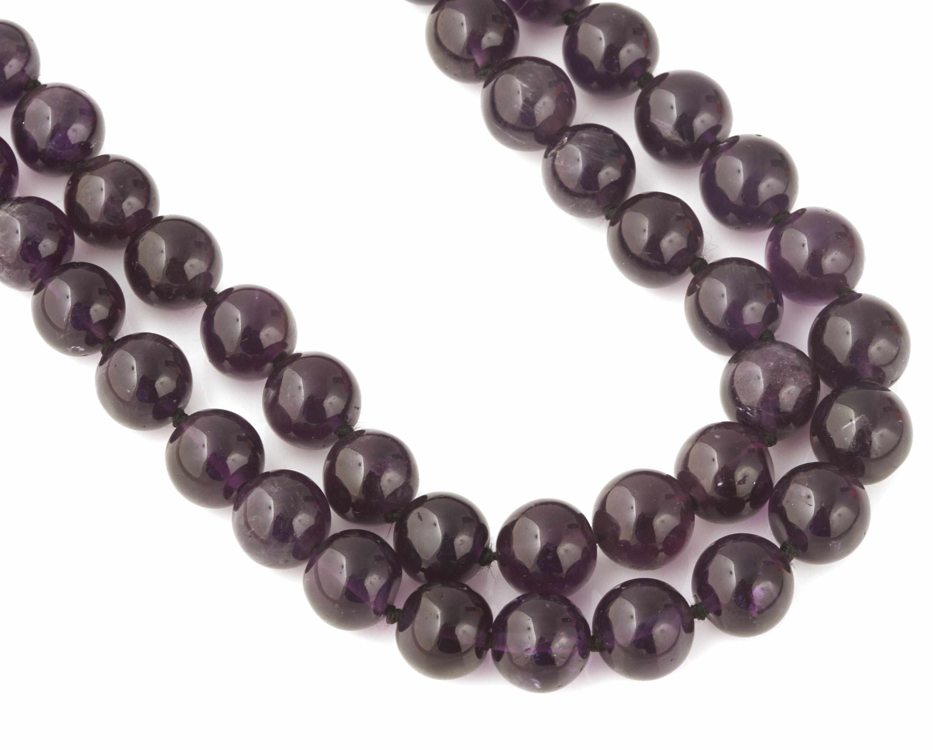 Appraisal: An amethyst bead and k gold necklace length in