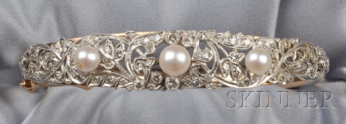 Appraisal: Diamond and Pearl Bracelet designed as three pearls amongst scrolling