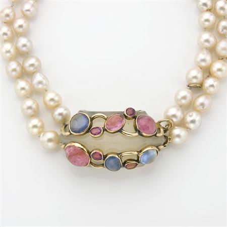 Appraisal: Double Strand Baroque Cultured Pearl Necklace with Agate Cabochon Sapphire