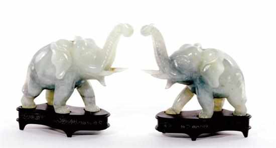 Appraisal: Pair Chinese carved jade elephants matched pair of standing figures