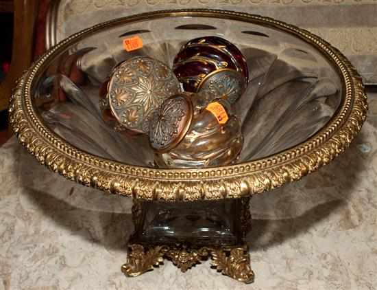 Appraisal: Rococo style brass-mounted glass center bowl with four plastic carpet