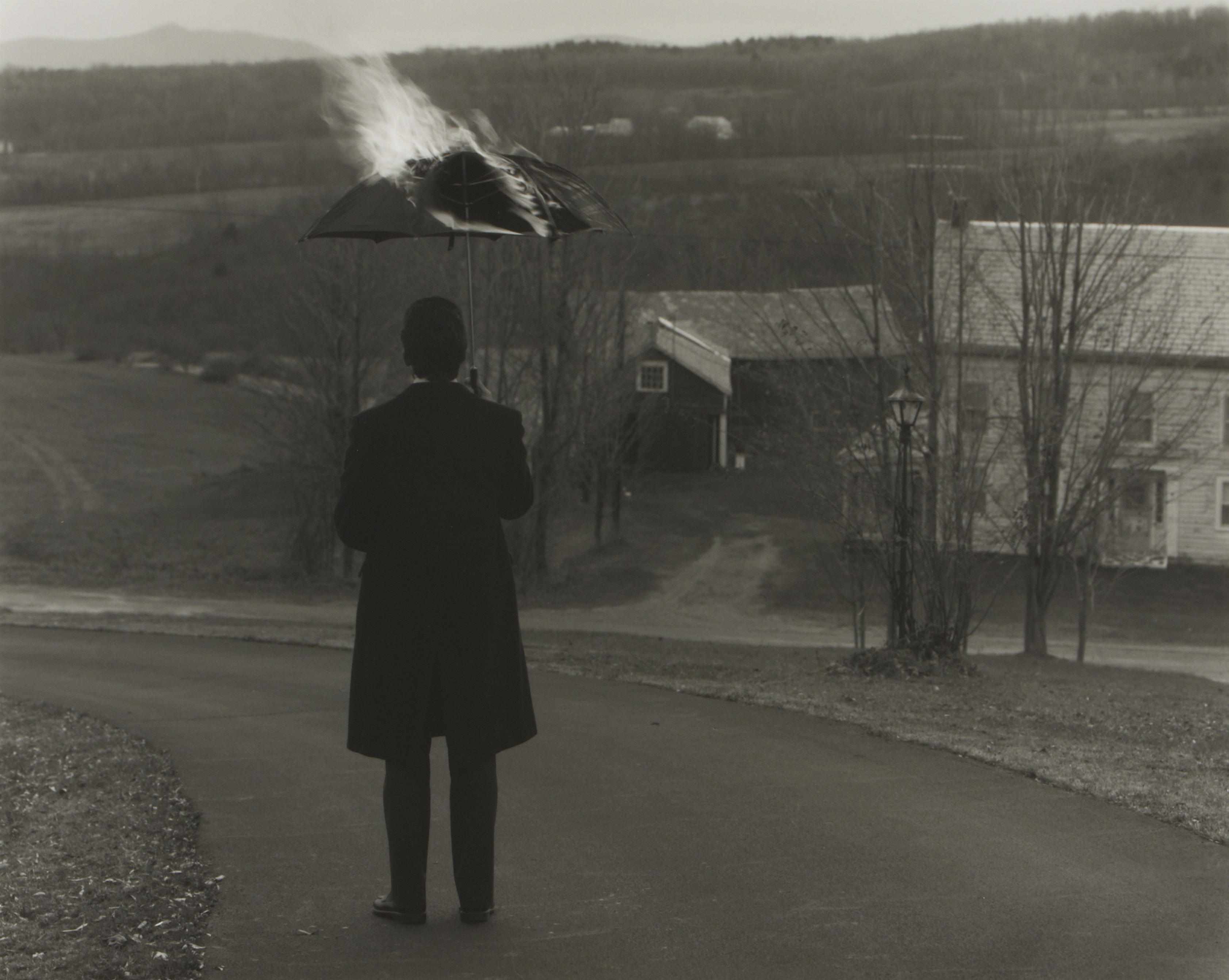 Appraisal: Unknown Artist Untitled Man Holding Umbrella Gelatin silver print hinged