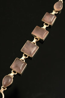 Appraisal: STERLING SILVER BRACELET SET WITH ROSE QUARTZ