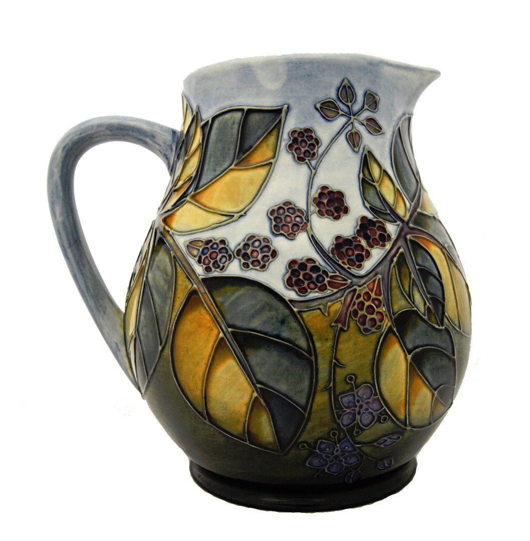 Appraisal: A Moorcroft 'Bramble' jug circa blue ground Sally Tuffin design