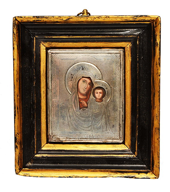 Appraisal: A SMALL SILVER MOUNTED RUSSIAN ICON Mary and the Christ