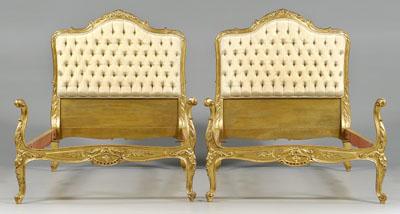 Appraisal: Louis XV style carved twin beds each with tufted silk