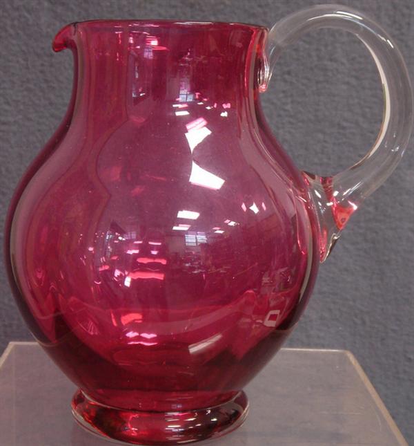 Appraisal: Cranberry glass pitcher applied clear handle ground pontil ribbed body