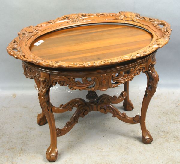 Appraisal: s carved mahogany table with tray top h x l