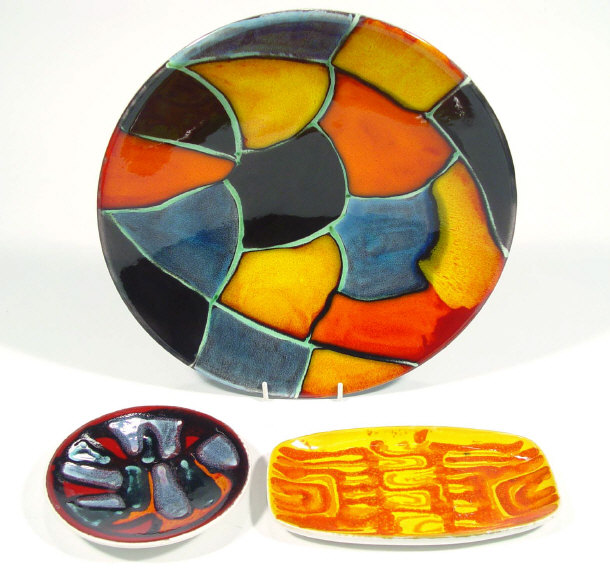 Appraisal: Three Poole pottery items two abstract Delphis dishes and a