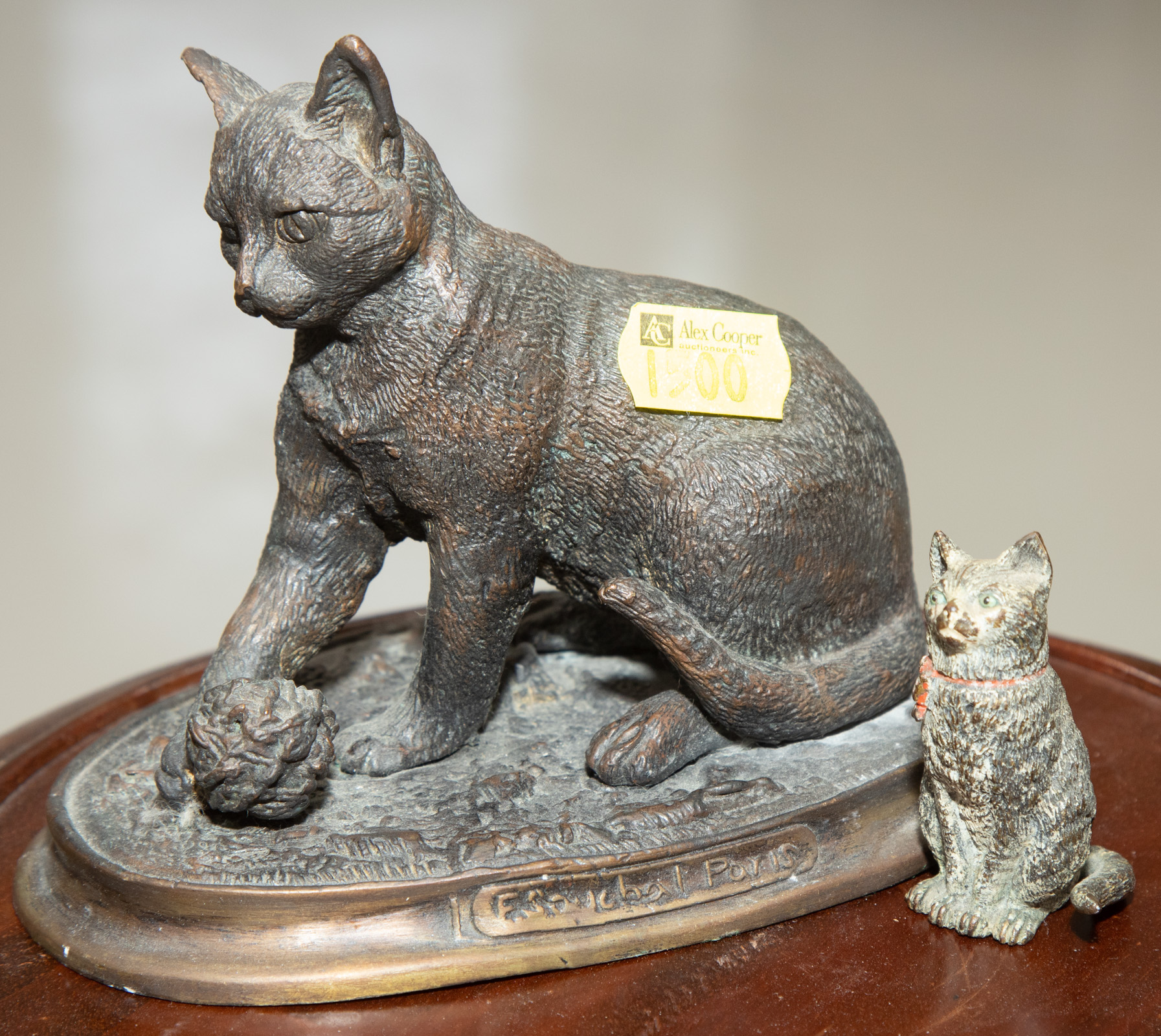 Appraisal: TWO SMALL BRONZE CAT FIGURES Including a Vienna cold-painted bronze