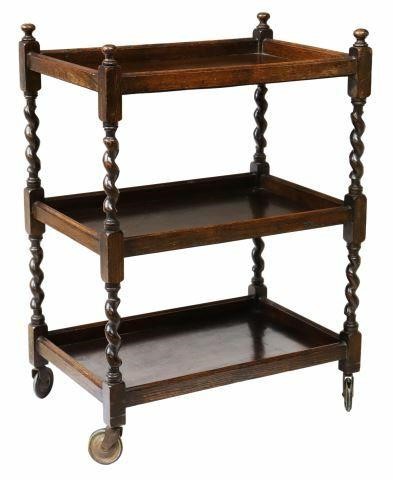 Appraisal: English oak tea trolley service cart mid th c turned