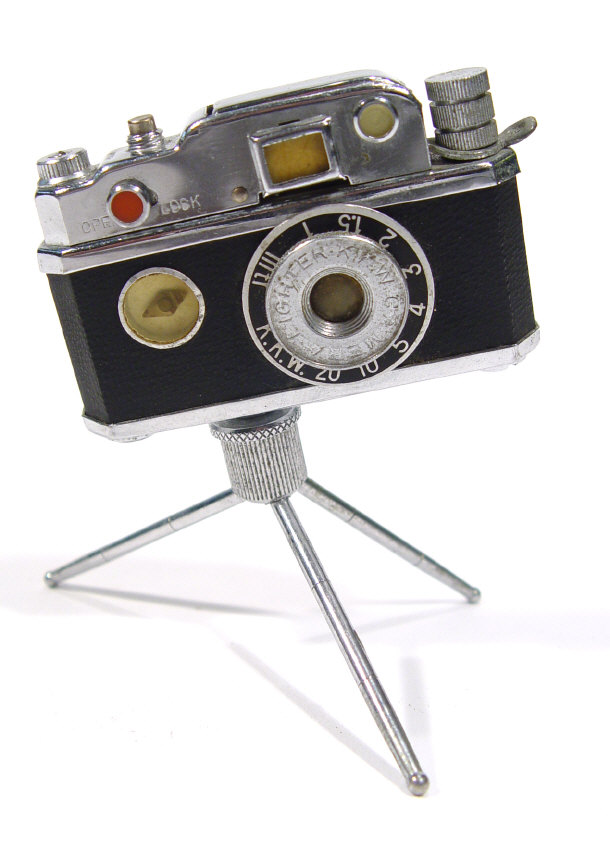 Appraisal: Novelty camera shaped table lighter on tripod stand cm high