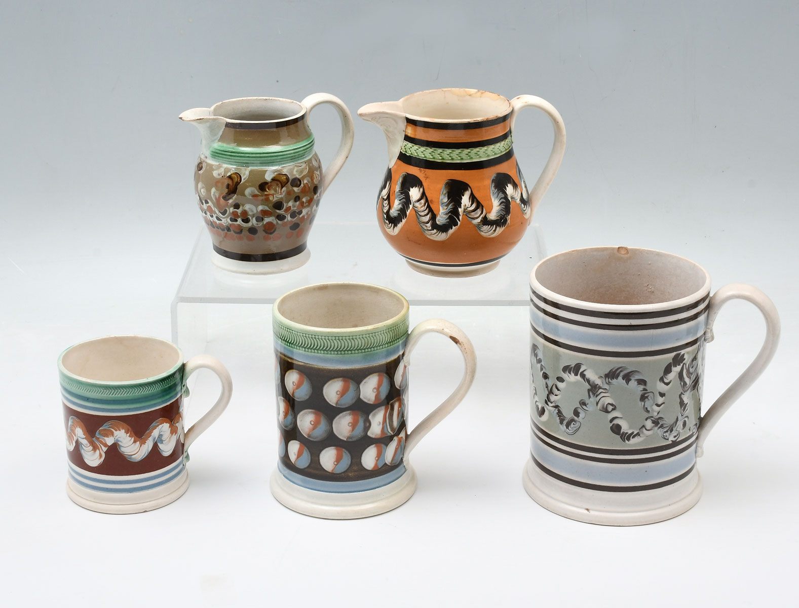 Appraisal: PIECE EARLY MOCHAWARE MUGS PITCHERS - Earthworm glazed mugs -