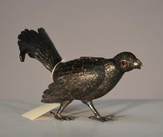 Appraisal: Bird Form Pepper Pot European silver hinged wings bird form