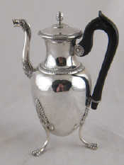 Appraisal: A French hallmarked silver coffee pot with three lion paw