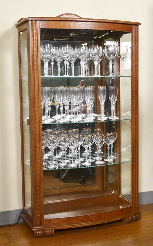 Appraisal: BOW FRONT DISPLAY CABINET Shaped crest with applied decoration bowed