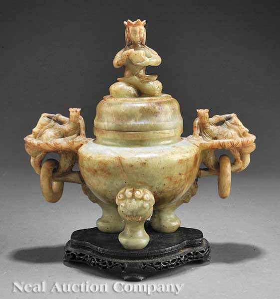 Appraisal: A Chinese Celadon and Russet Jade Tripod Covered Censer the