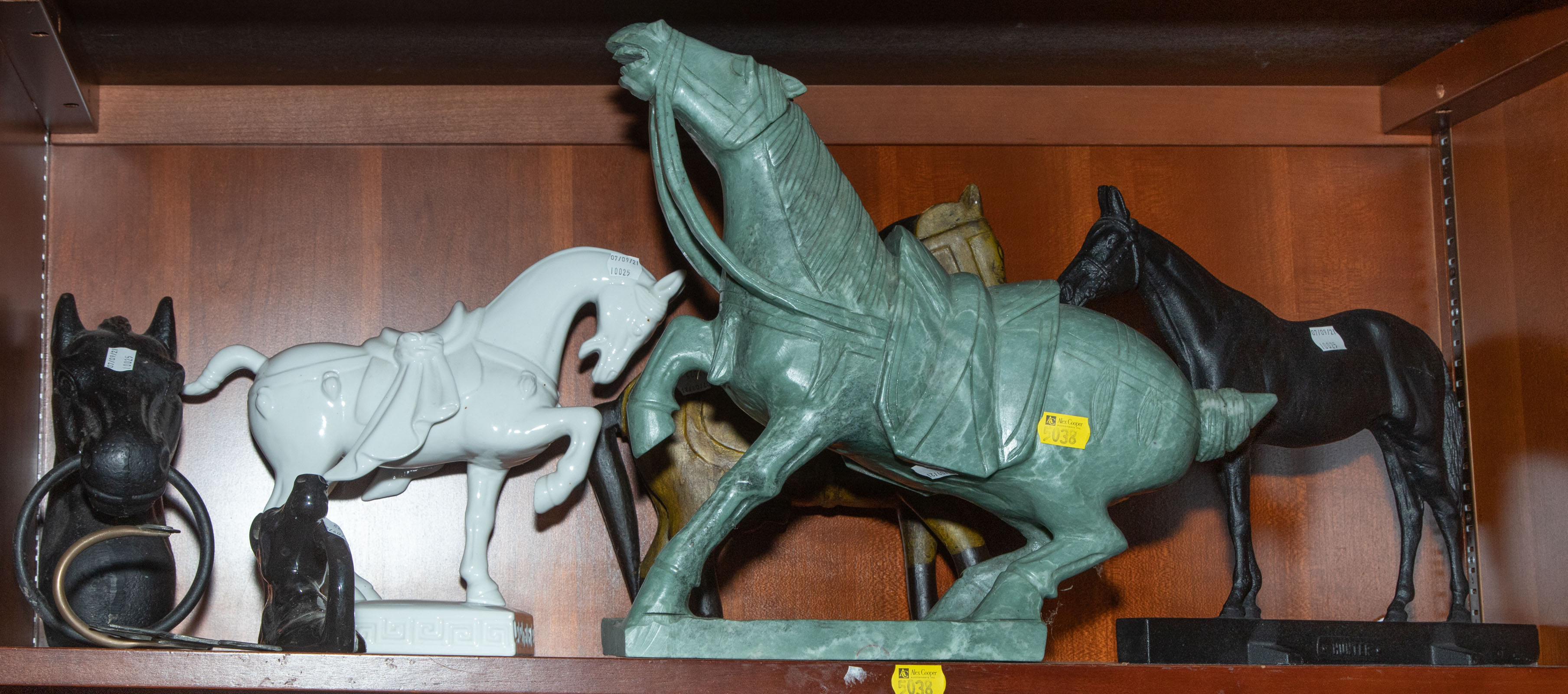 Appraisal: A GROUP OF HORSE RELATED ITEMS Includes folk art carved