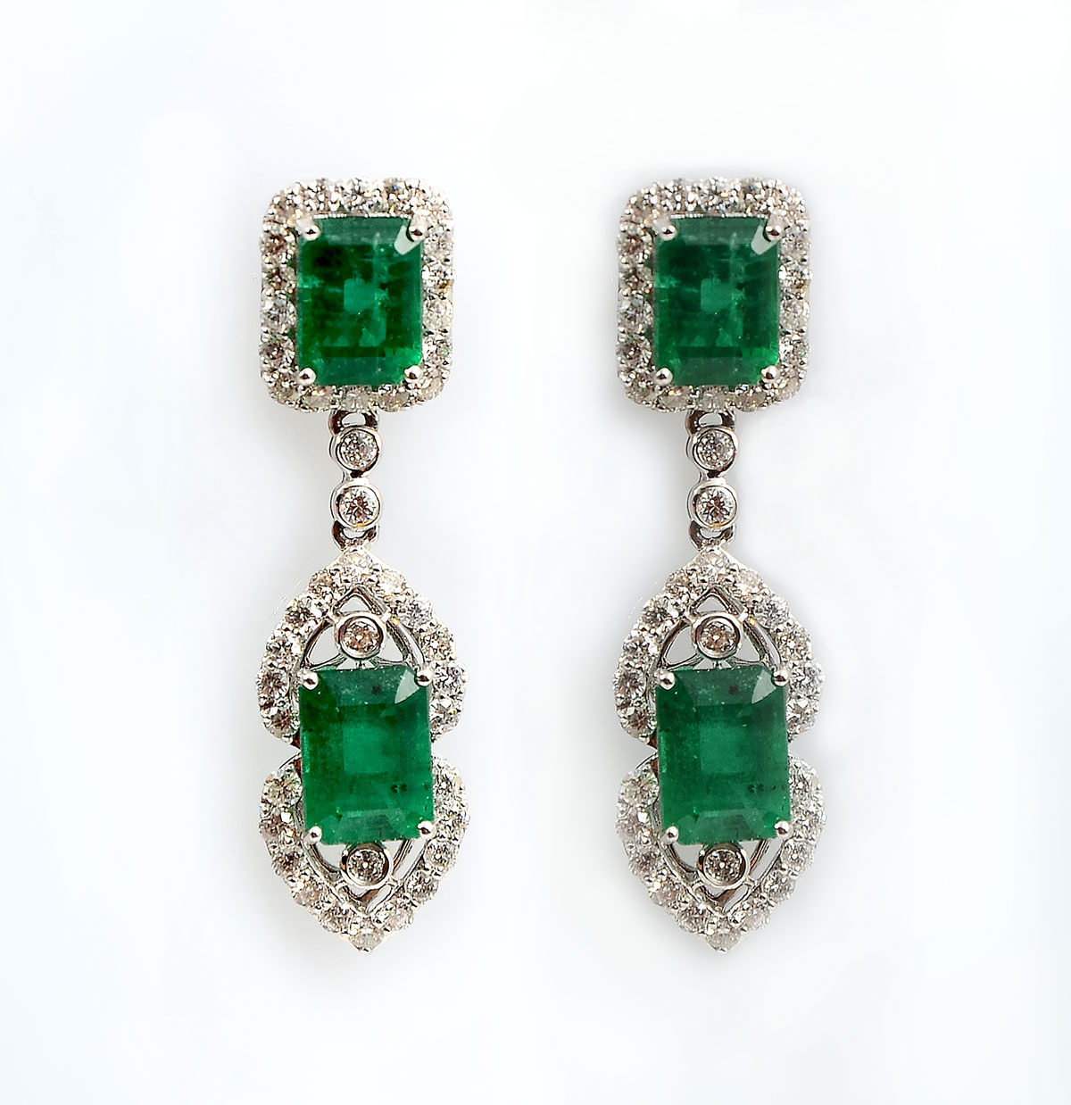 Appraisal: K CTW EMERALD DIAMOND PENDANT EARRINGS prong set rectangular mixed