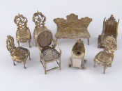 Appraisal: A group of four miniature silver chairs London a settee