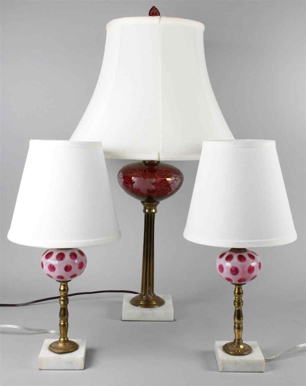 Appraisal: RED GLASS LAMP WITH A PAIR OF BOHEMIAN GLASS BRASS