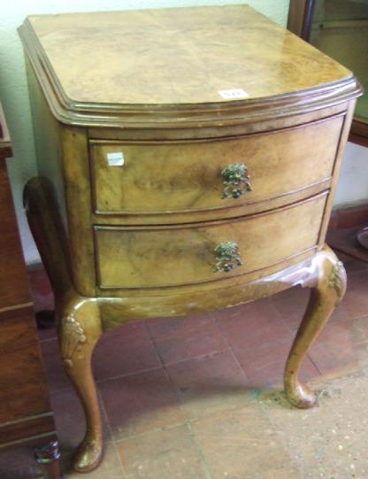 Appraisal: A walnut two drawer bedside table on cabriole legs cm