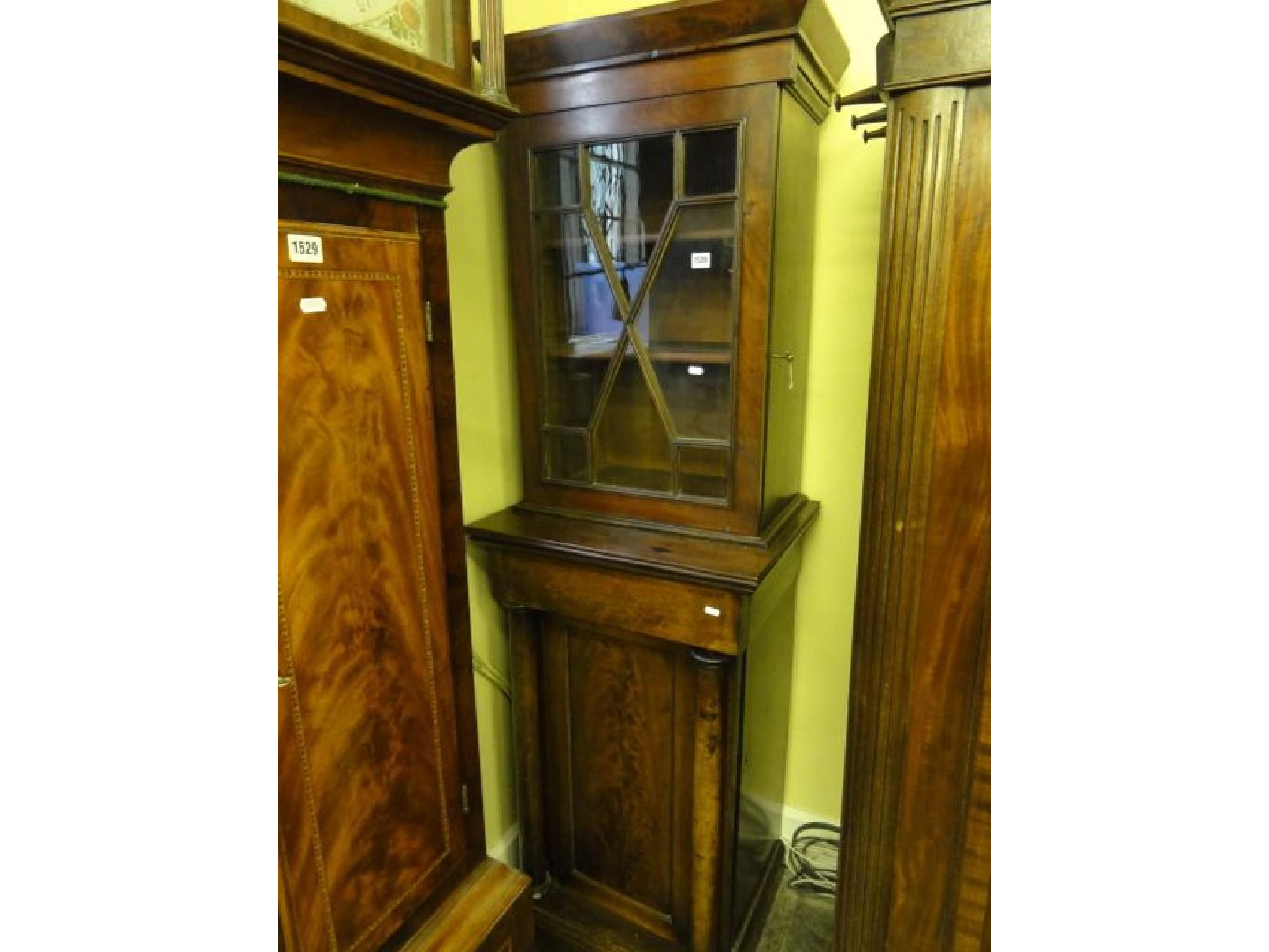 Appraisal: A th century mahogany pedestal side cabinet the upper section