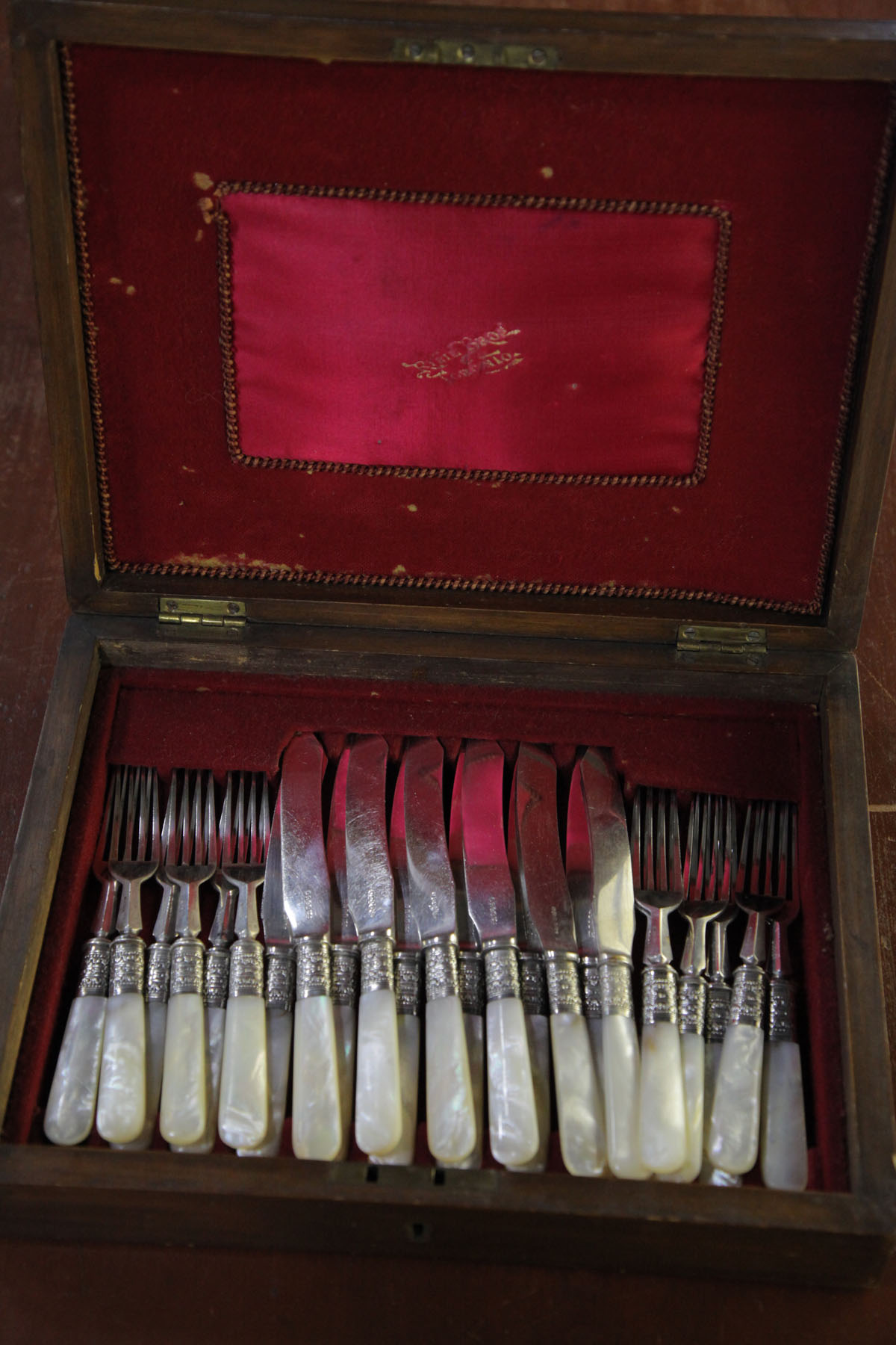 Appraisal: TWENTY-FOUR PIECES OF MOTHER OF PEARL HANDLED FLATWARE England late