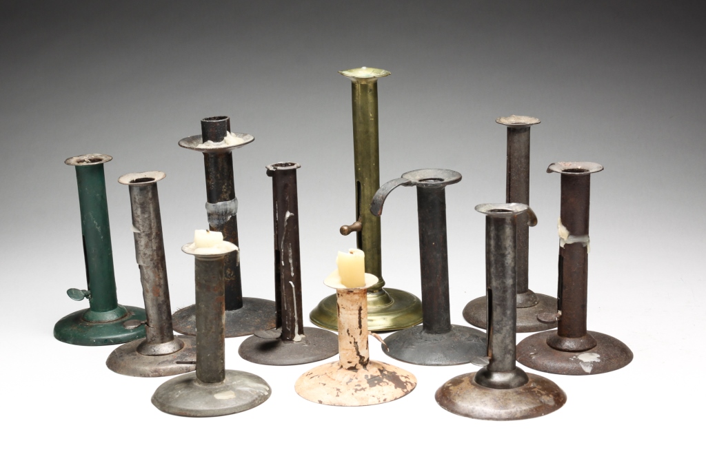 Appraisal: ELEVEN HOGSCRAPER CANDLESTICKS American and English th century- th century